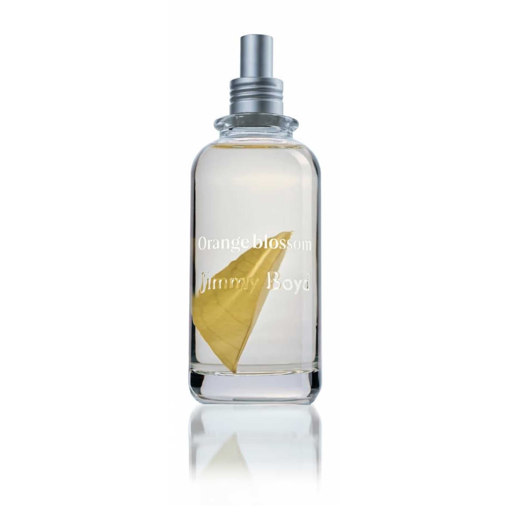 Frasco de fragancia bio orgánica Orange Blossom con ingredientes naturales y envase reciclable